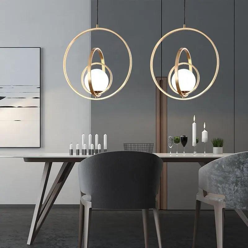 Rota Pendant Light with Rotating Gold Finish and Unique Design for Kitchen and Living Spaces 0