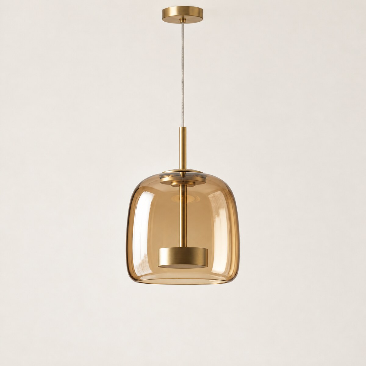 Kelda amber glass pendant light with brass LED core