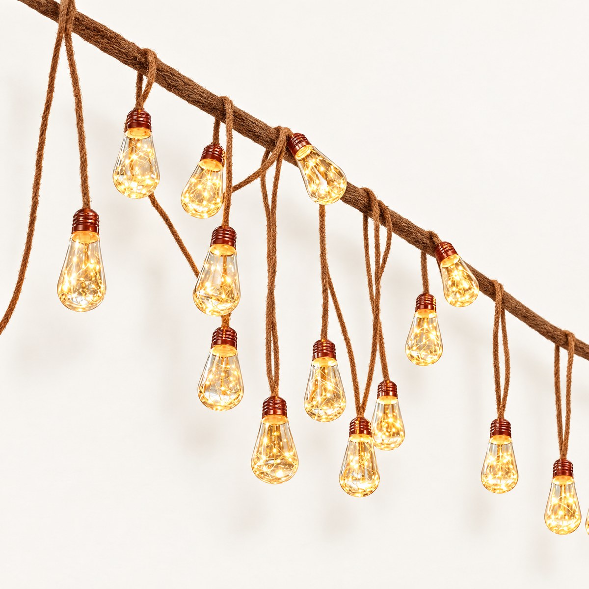 Solstice solar string lights with clear oval filament bulbs on rope