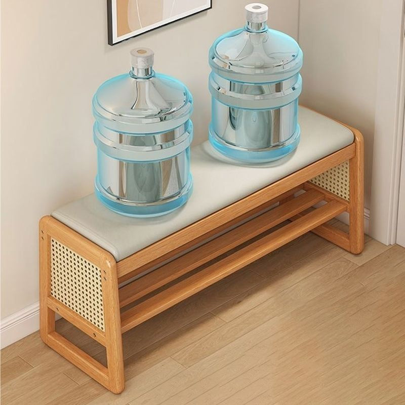 Varello shoe bench supporting heavy water bottles to show its strength