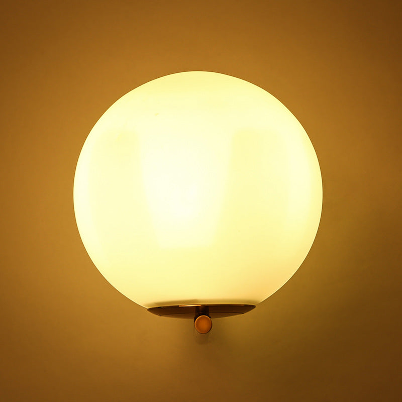 VALORA Mid-Century Modern Brass Wall Sconce with Opal Glass Globe - Styyler