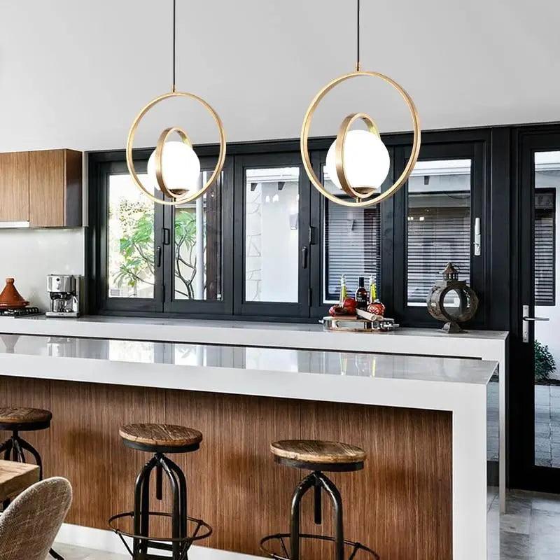 Rota Pendant Light with Rotating Gold Finish and Unique Design for Kitchen and Living Spaces 1