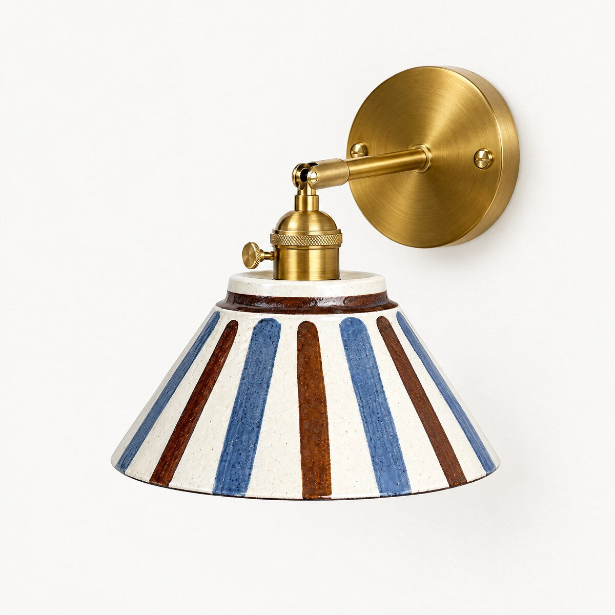 Birk hand-painted ceramic wall light in Sunburst Lines with brushed brass arm
