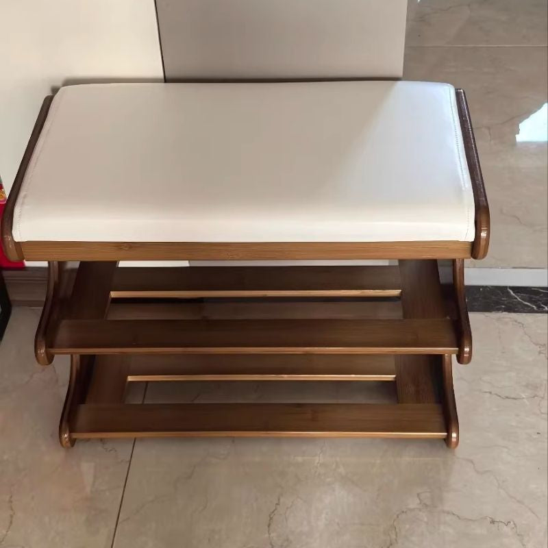 Dorvyn shoe bench seen from the end, showing the padded seat