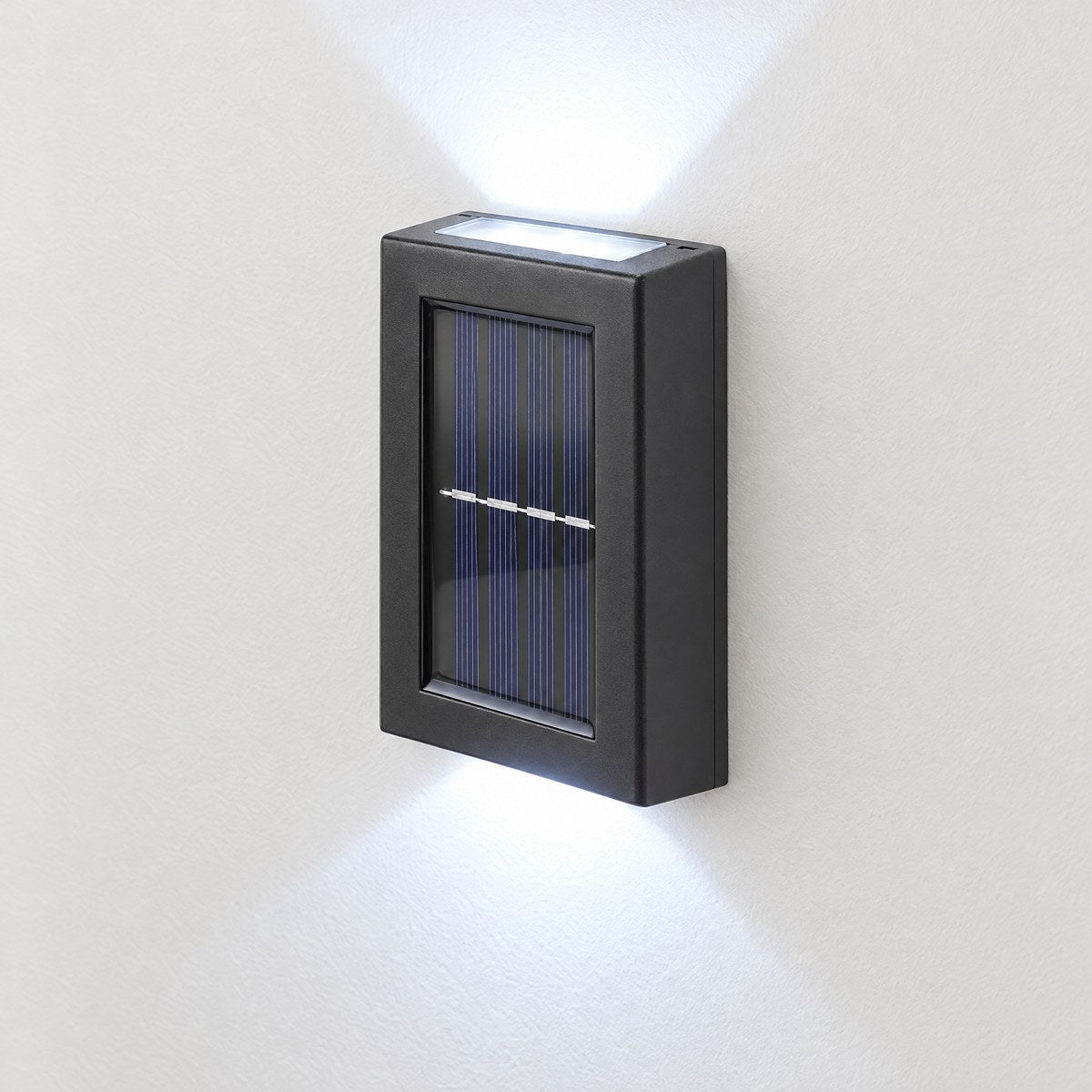 Glint solar up and down wall light casting crisp cool white light