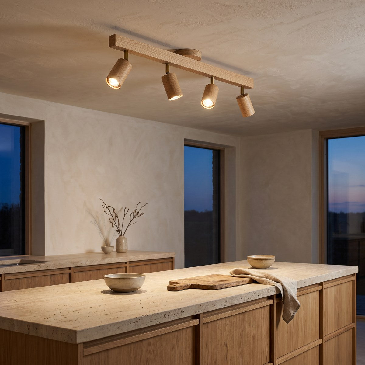 Holt four-head oak spotlight above a travertine kitchen worktop