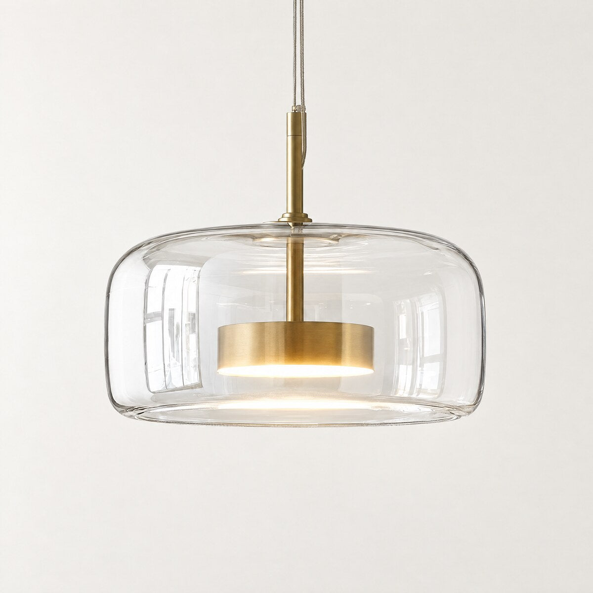 Kelda clear glass drum pendant light, 35cm, with brass LED disc
