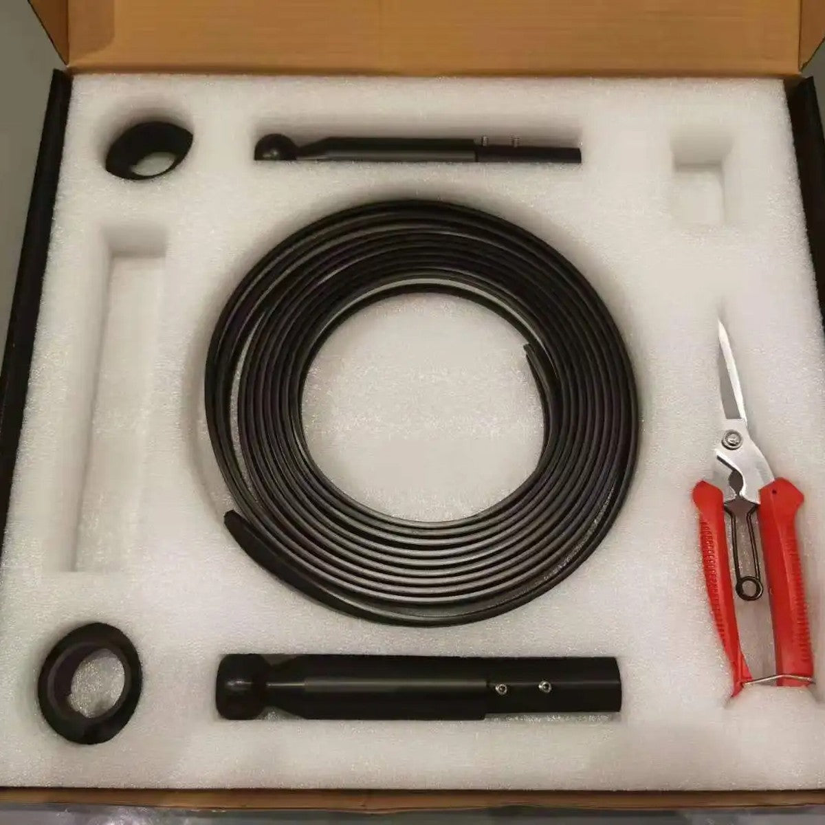 Linea black installation kit in the box with LED strip, end fittings, wall caps and cutters