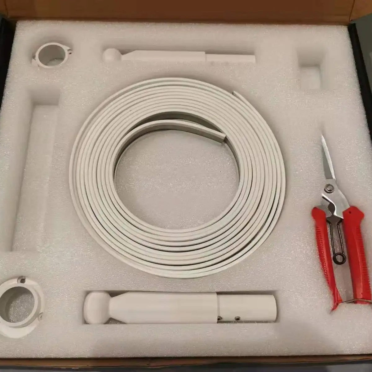 Linea white installation kit in the box with LED strip, end fittings, wall caps and cutters