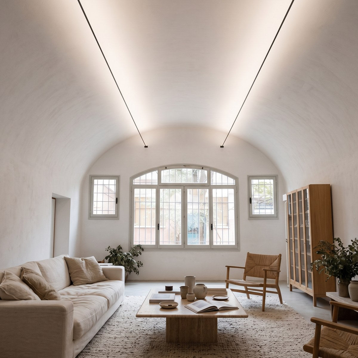 Linea slim linear LED lights washing the walls of a calm living room