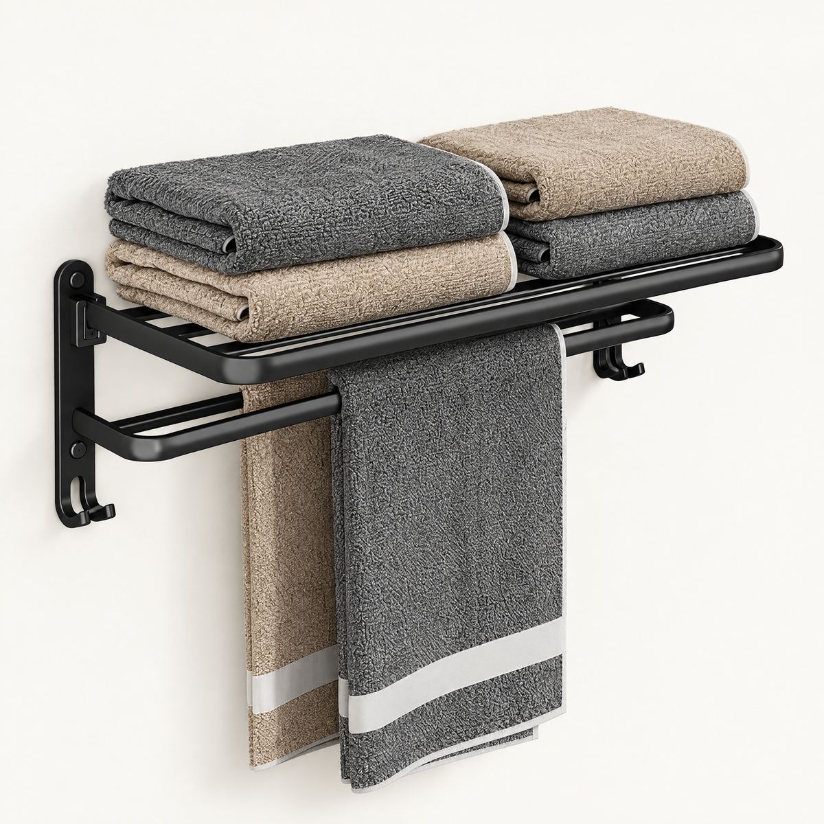 Strata matte black folding towel rack with slatted shelf, two bars and hooks on a white wall
