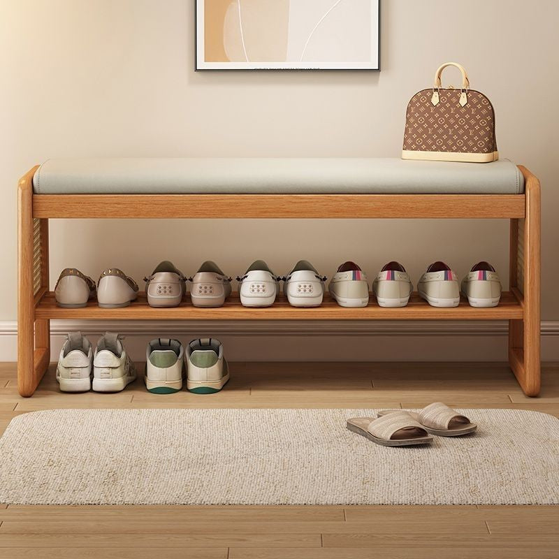 Varello shoe bench seen from the front with shoes on its shelves